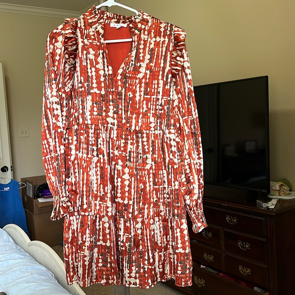 THML long sleeve tired dress with elastic around wrist.